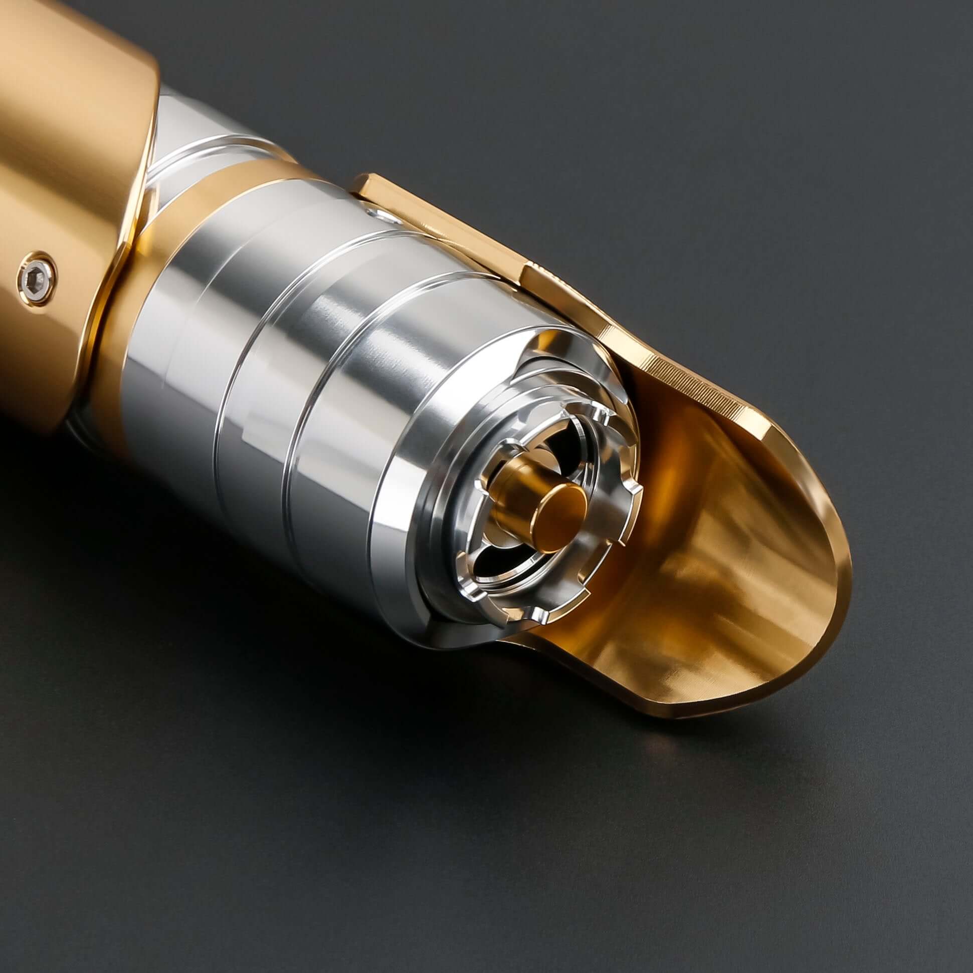 Skeleton Crew SE lightsaber with silver and gold hilt, featuring Baselit, S-RGB, Neopixel, or Proffie core options, 12 blade colors, multiple blade effects, and a durable design suitable for display and light dueling.