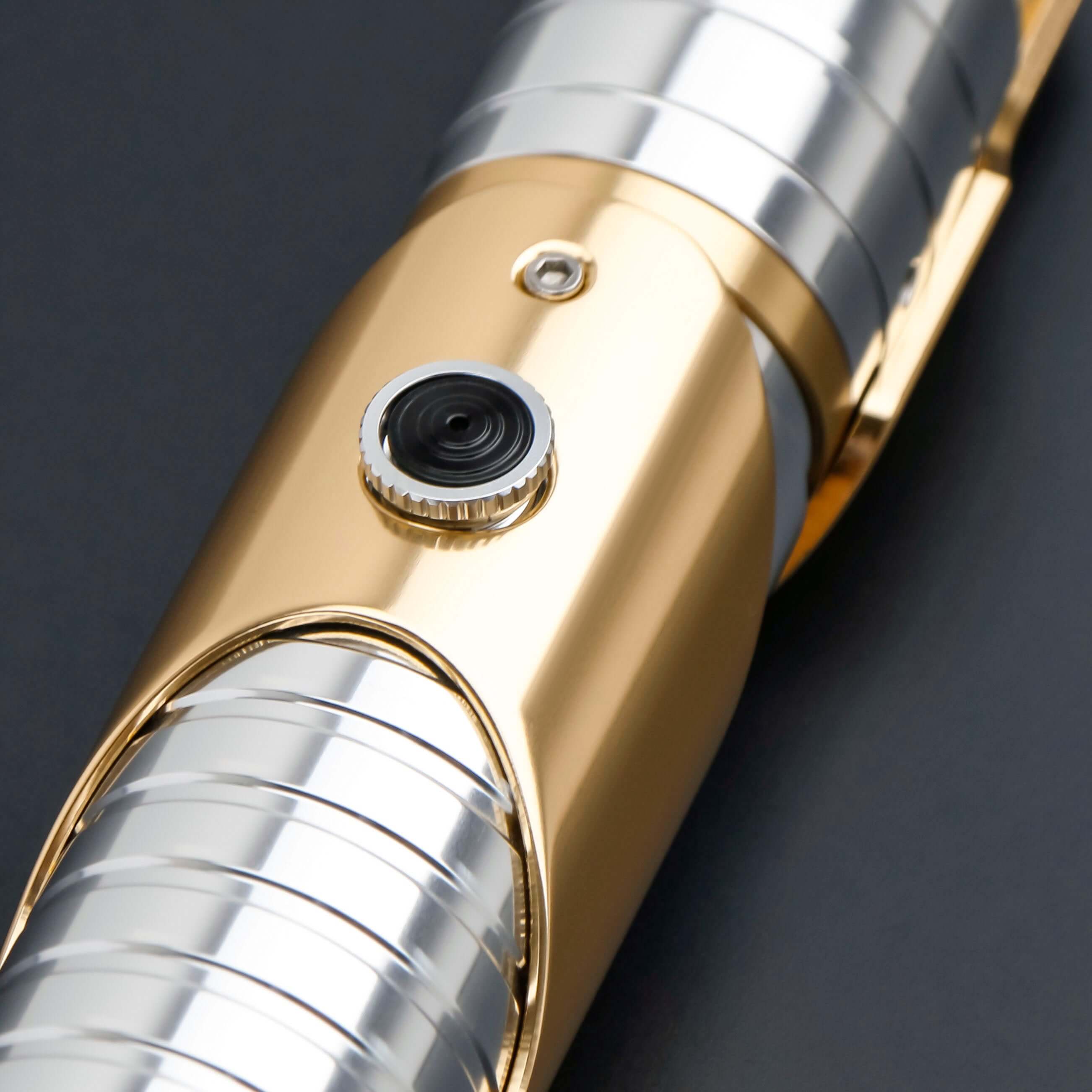 Skeleton Crew SE lightsaber with silver and gold hilt, featuring Baselit, S-RGB, Neopixel, or Proffie core options, 12 blade colors, multiple blade effects, and a durable design suitable for display and light dueling.