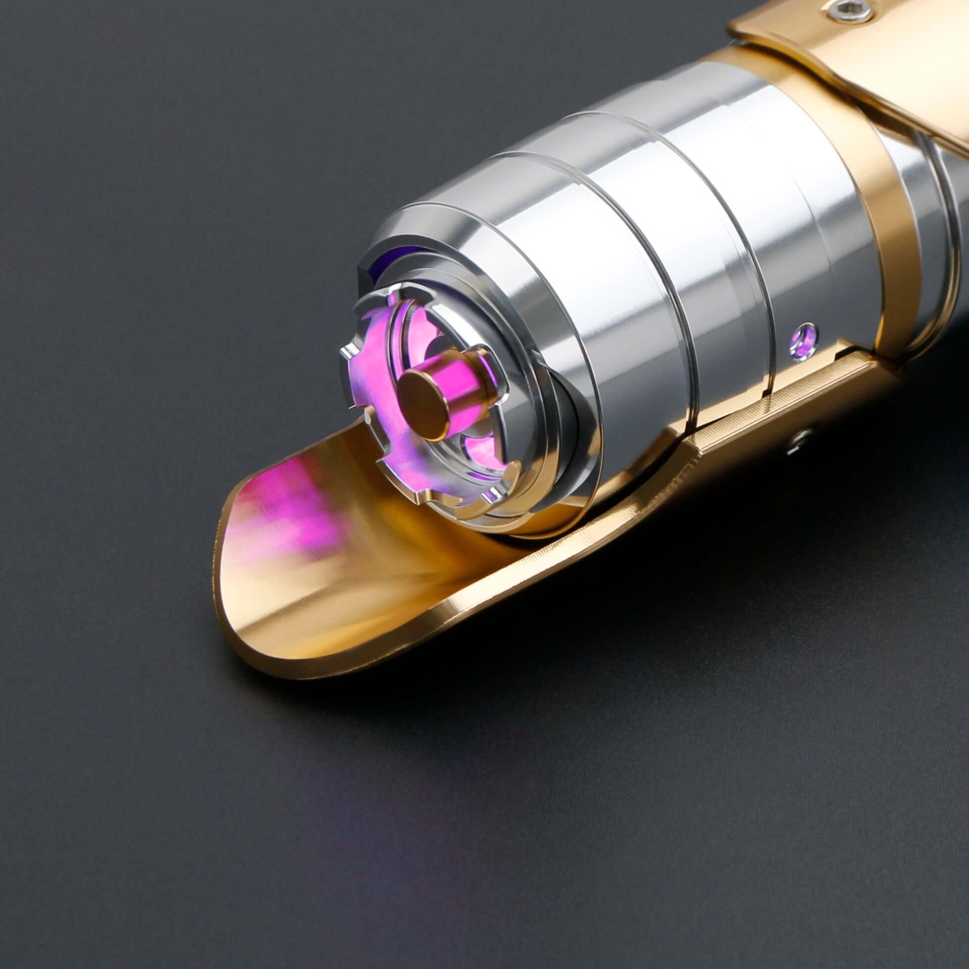 Skeleton Crew SE lightsaber with silver and gold hilt, featuring Baselit, S-RGB, Neopixel, or Proffie core options, 12 blade colors, multiple blade effects, and a durable design suitable for display and light dueling.