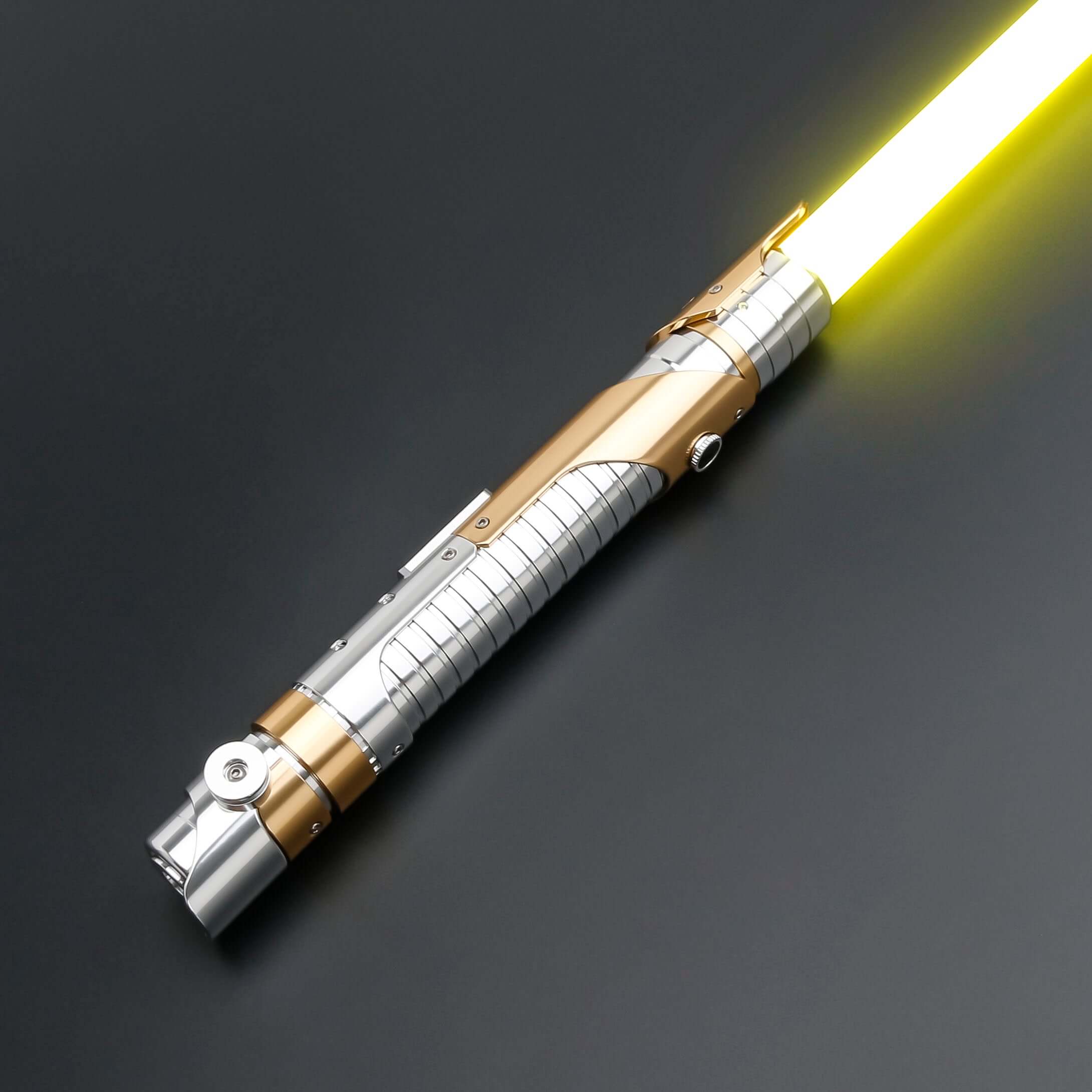 Skeleton Crew SE lightsaber with silver and gold hilt, featuring Baselit, S-RGB, Neopixel, or Proffie core options, 12 blade colors, multiple blade effects, and a durable design suitable for display and light dueling.