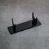 Black acrylic display stand designed for showcasing collectibles like sabers with stability and style.