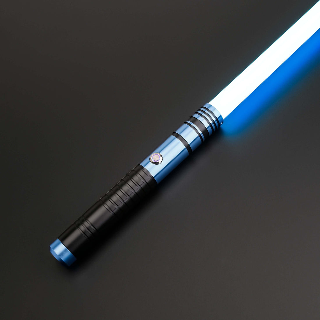 Padawan A01RGB Neopixel Saber – Ergonomic aluminum hilt with gold accents, high-quality removable polycarbonate blade, customizable RGB colors via app, realistic sound effects with multiple sound fonts, rechargeable 18650 battery, smooth swing motion for
