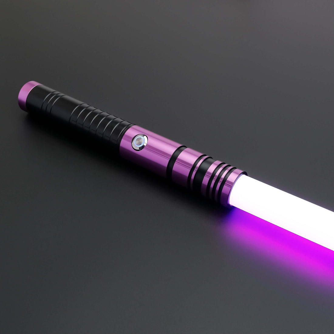 Padawan A01RGB Neopixel Saber – Ergonomic aluminum hilt with gold accents, high-quality removable polycarbonate blade, customizable RGB colors via app, realistic sound effects with multiple sound fonts, rechargeable 18650 battery, smooth swing motion for