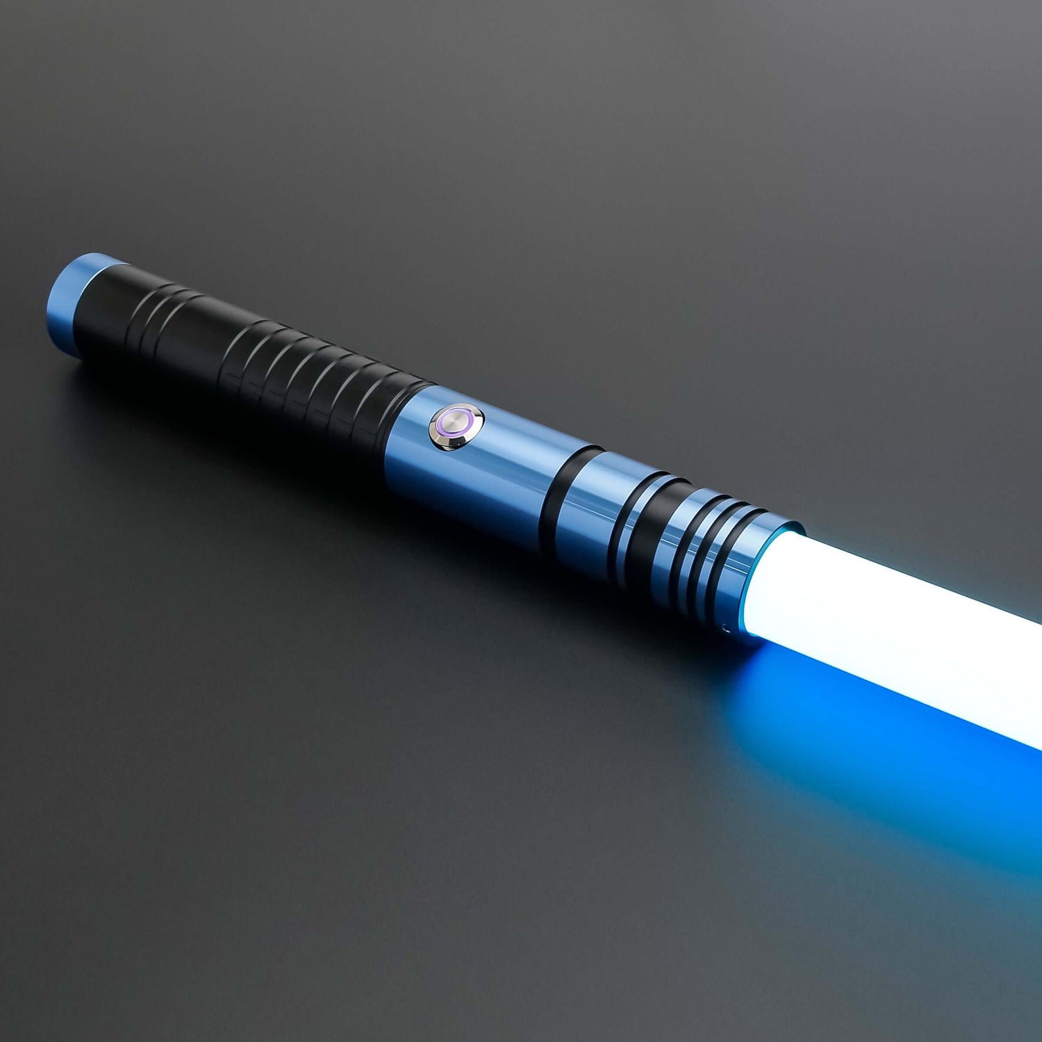 Padawan A01RGB Neopixel Saber – Ergonomic aluminum hilt with gold accents, high-quality removable polycarbonate blade, customizable RGB colors via app, realistic sound effects with multiple sound fonts, rechargeable 18650 battery, smooth swing motion for