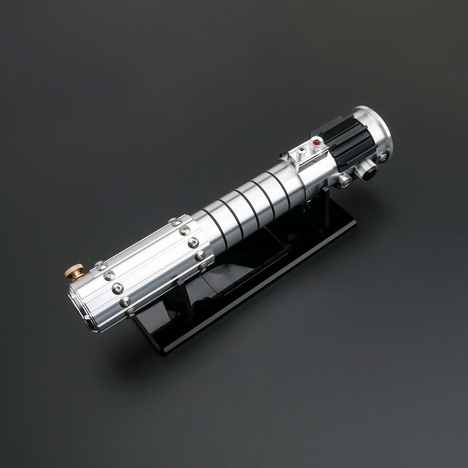 Mara Jade Lightsaber from Novasaber, featuring a sleek, crimson blade and a detailed, silver hilt with elegant design accents, inspired by the iconic Star Wars character.