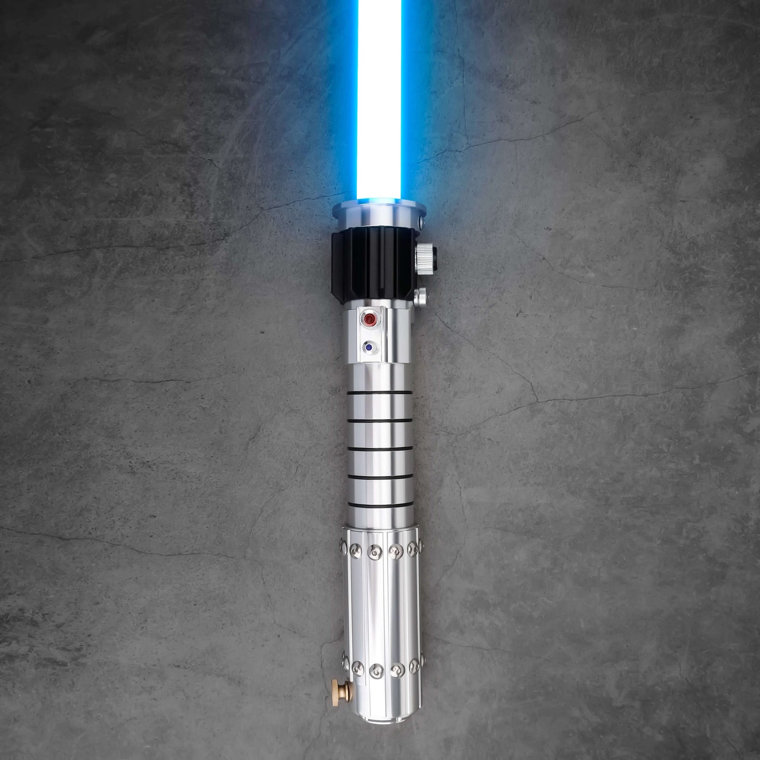Mara Jade Lightsaber from Novasaber, featuring a sleek, crimson blade and a detailed, silver hilt with elegant design accents, inspired by the iconic Star Wars character.