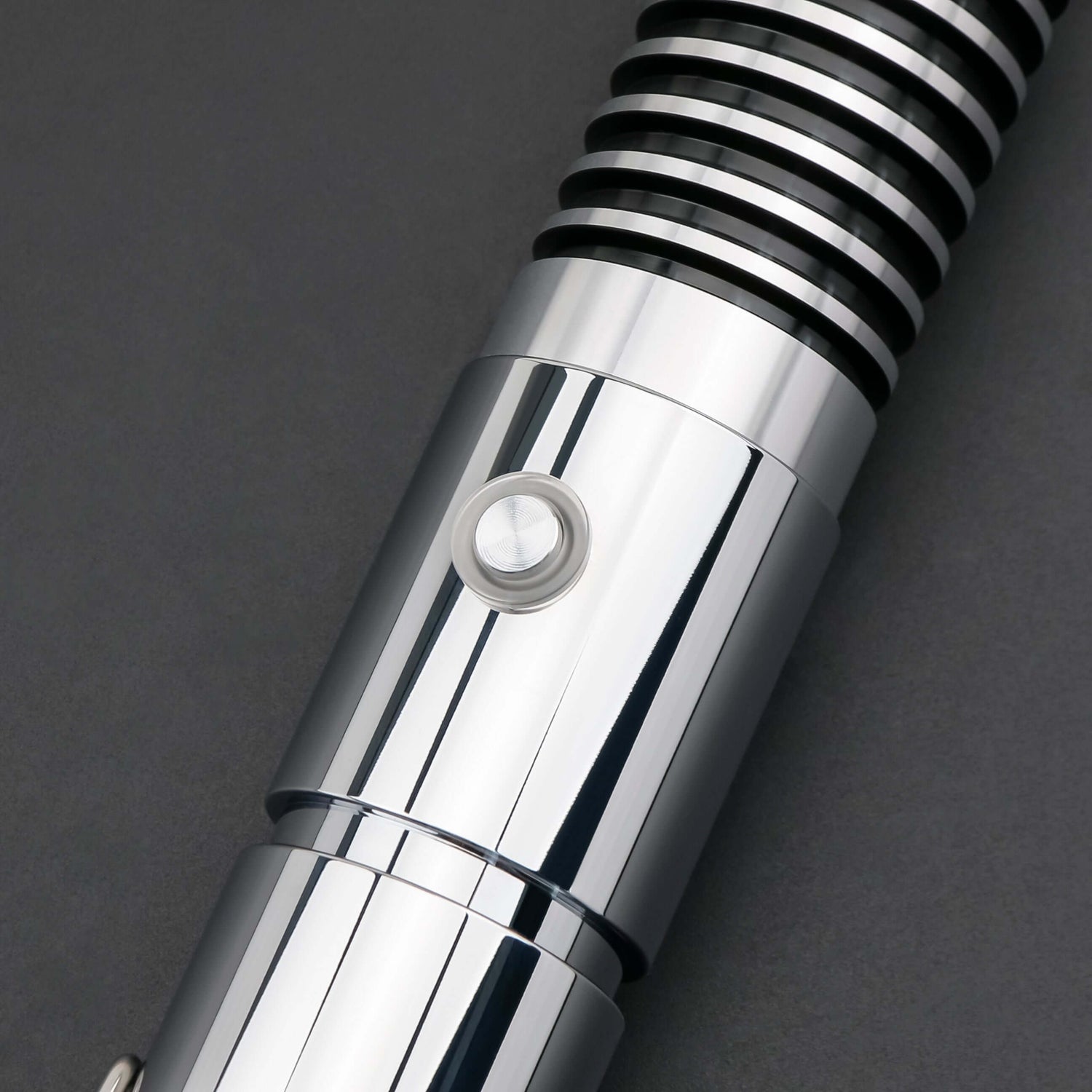 Luke SE Lightsaber from Novasaber, featuring a polished silver hilt with detailed gold accents and a vibrant green blade, inspired by the iconic weapon of Luke Skywalker from Star Wars