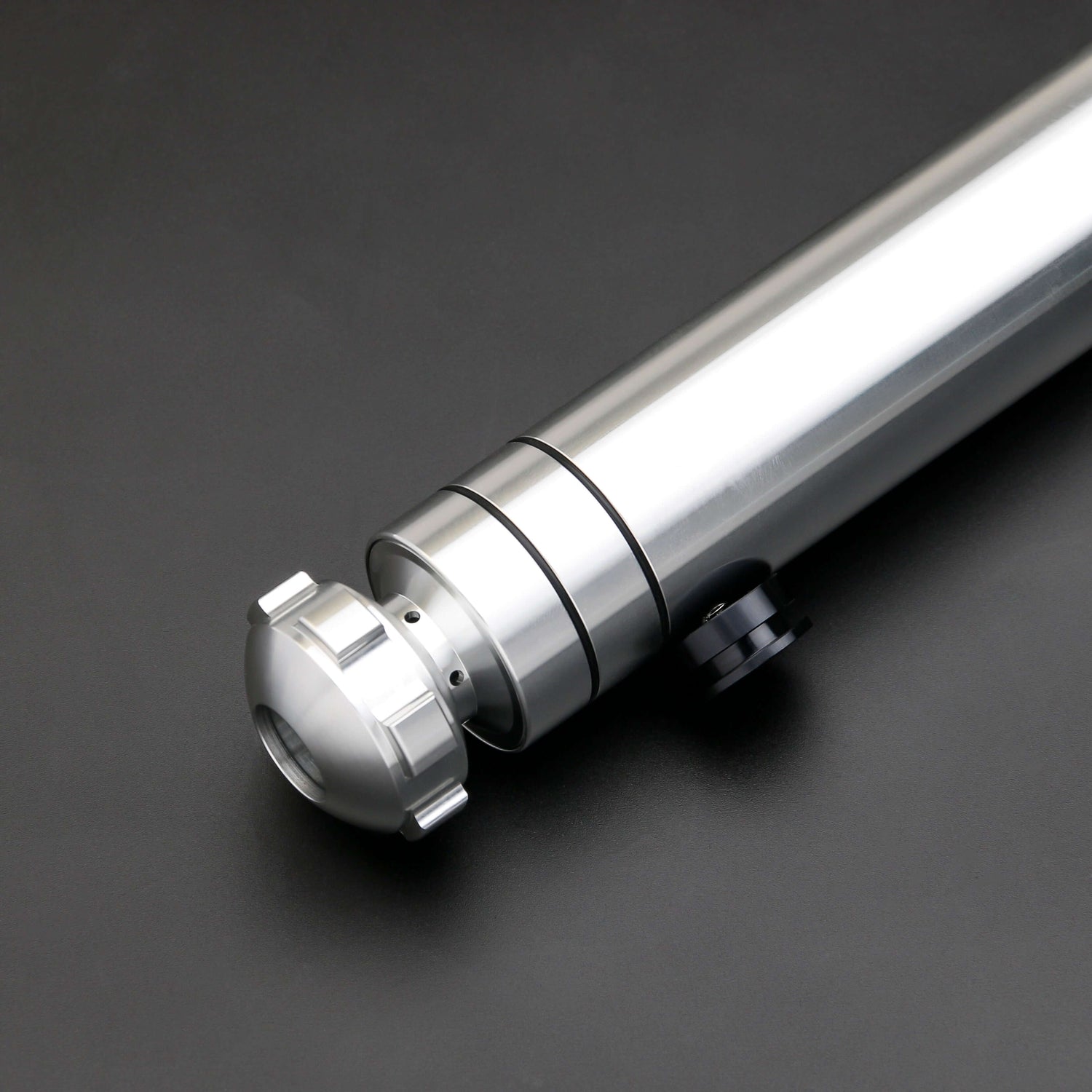 Huracan Double Bladed Saber featuring a compact design, belt clip for easy carrying, complimentary hilt connector, available in black and silver colors, with blade lengths of 82cm and 92cm, and various electronics options including RGB S16, RGB S27, SN Ne