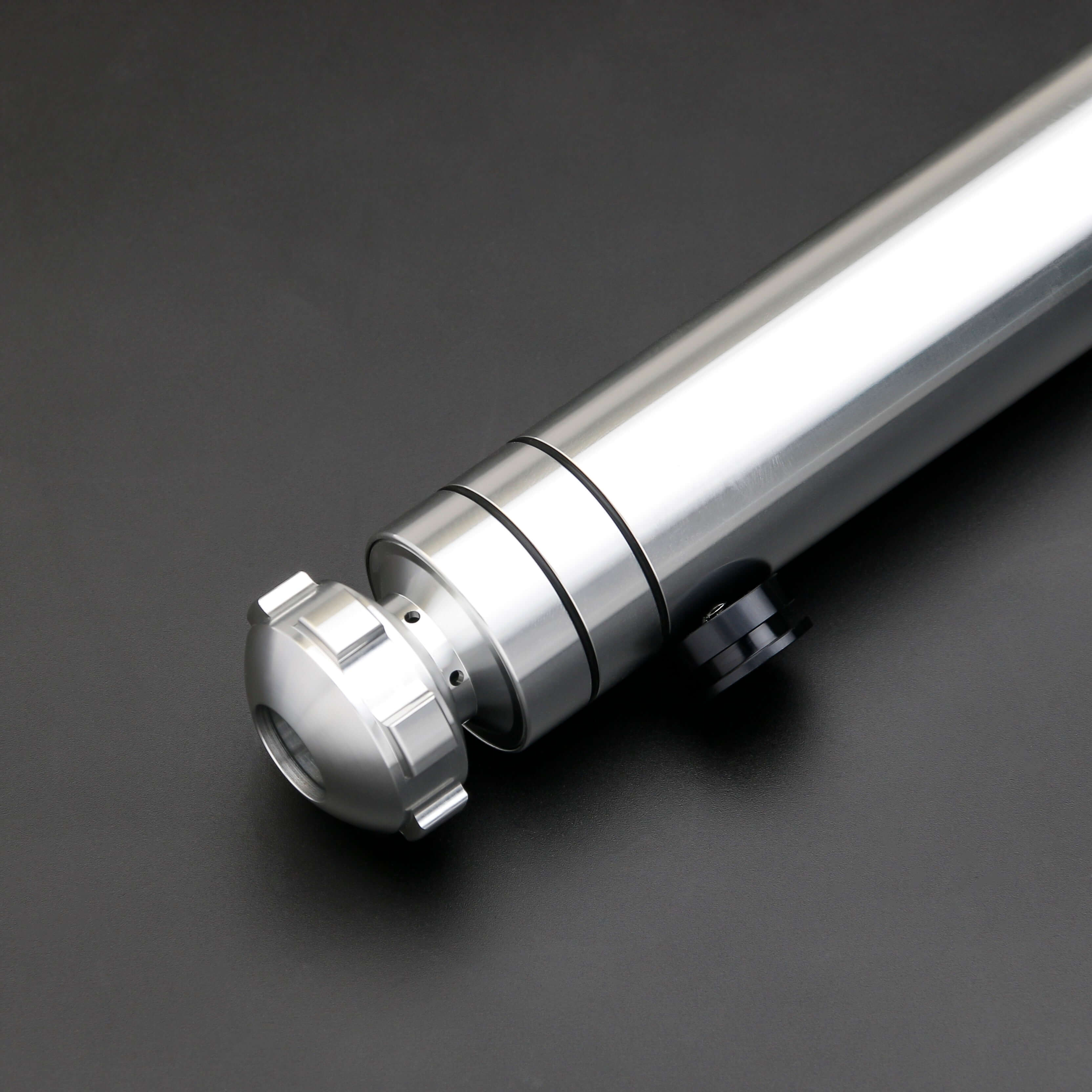 Huracan Double Bladed Saber featuring a compact design, belt clip for easy carrying, complimentary hilt connector, available in black and silver colors, with blade lengths of 82cm and 92cm, and various electronics options including RGB S16, RGB S27, SN Ne