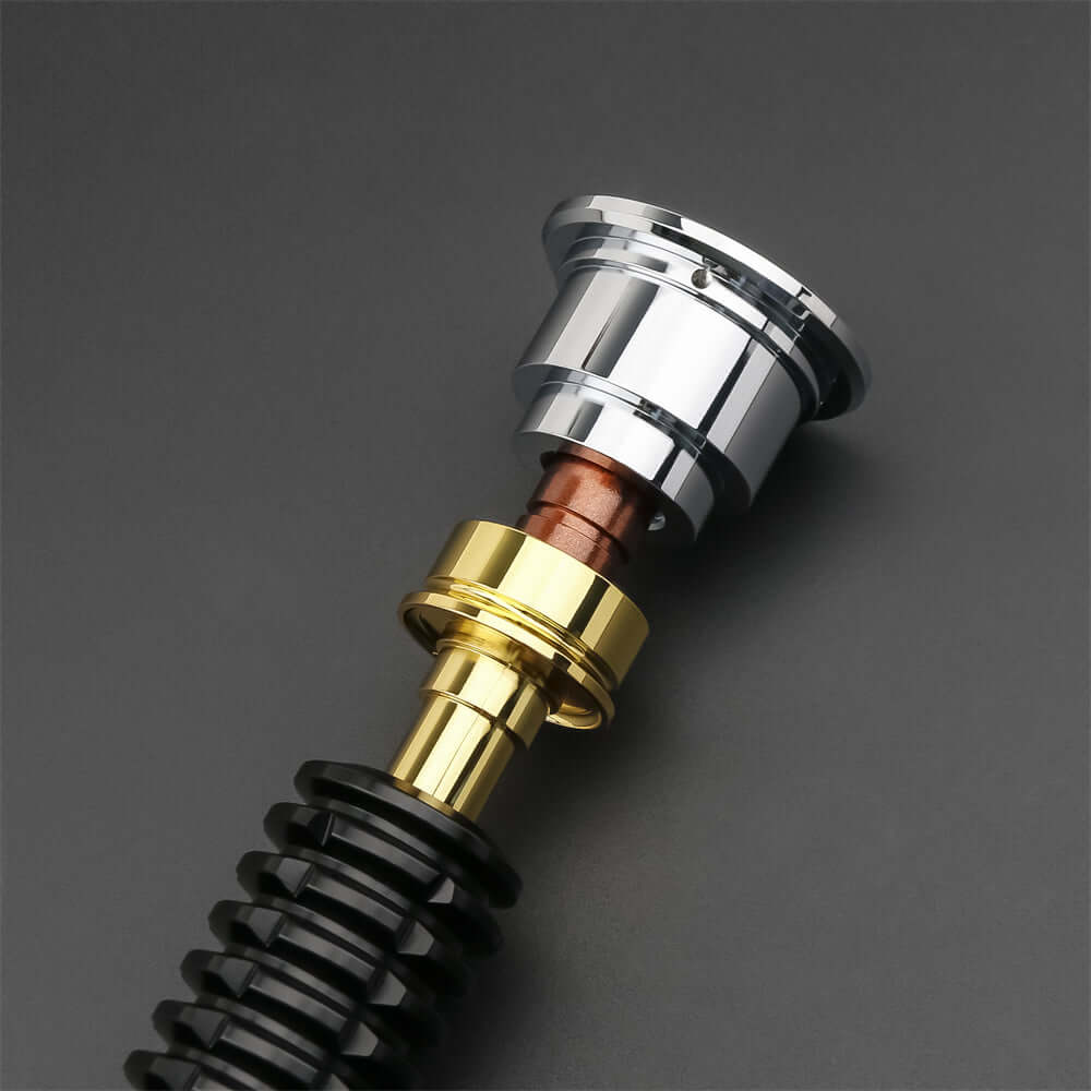 Obi EP3 lightsaber replica hilt with shiny chrome and gold accents on a black grip background.