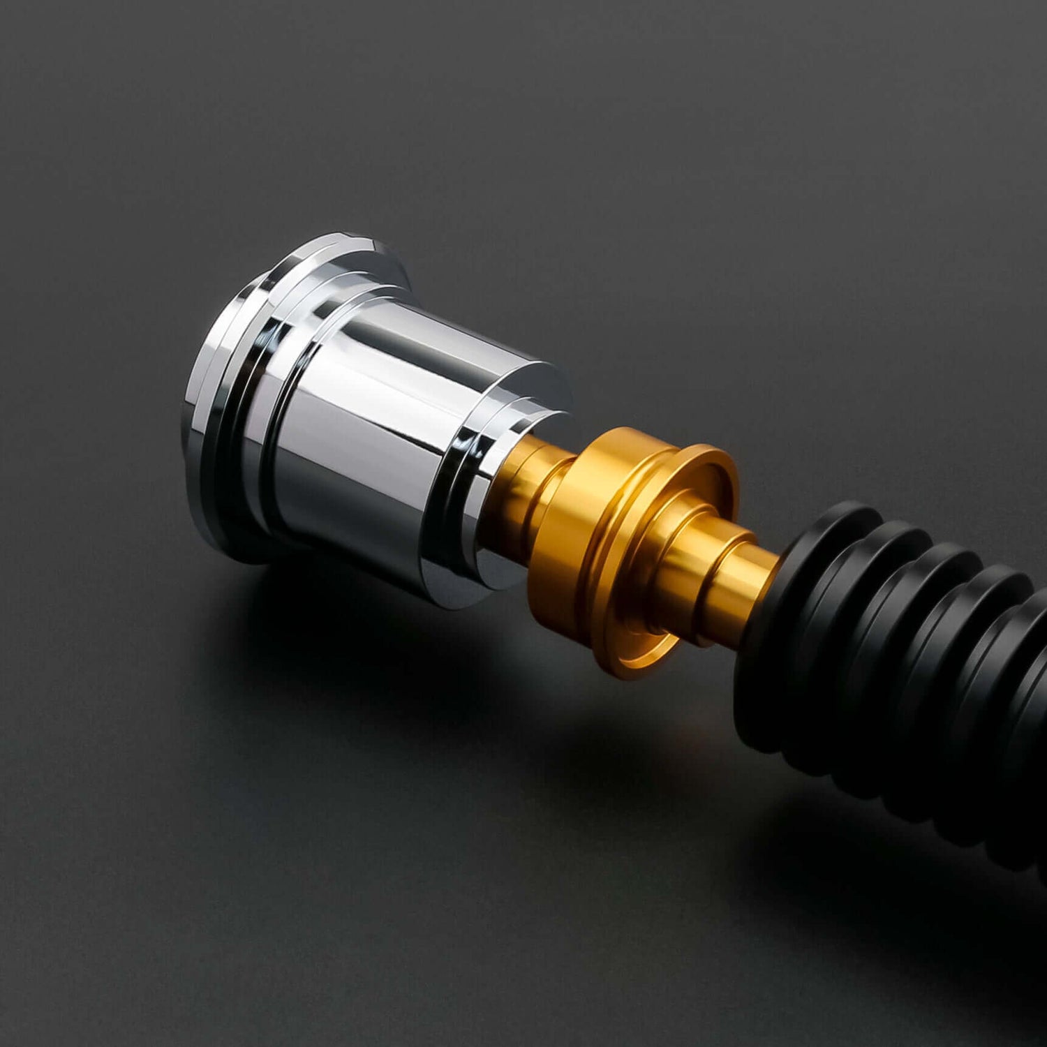 Detailed view of the Obi-Wan Kenobi Neopixel Lightsaber hilt with chrome and gold accents.