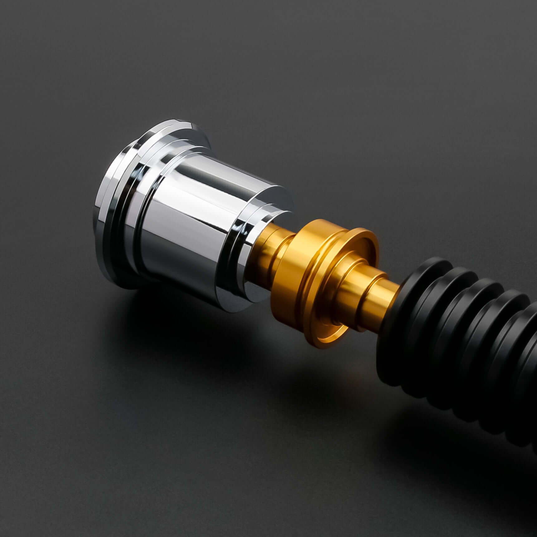 Detailed view of the Obi-Wan Kenobi Neopixel Lightsaber hilt with chrome and gold accents.