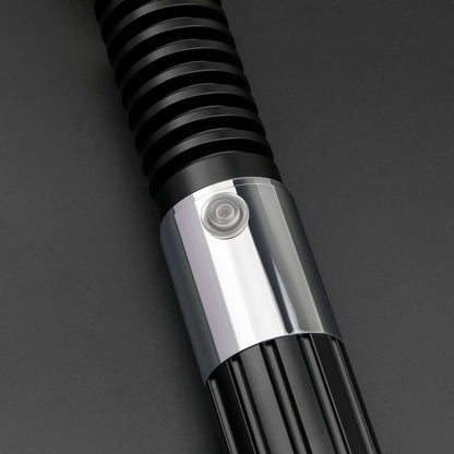 Close-up of the Obi-Wan Kenobi Neopixel Lightsaber hilt, showcasing its detailed design and button.