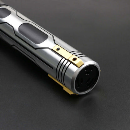 Close-up of the Skyrim lightsaber showcasing its sleek silver design and ornate gold accents for enhanced grip and style.