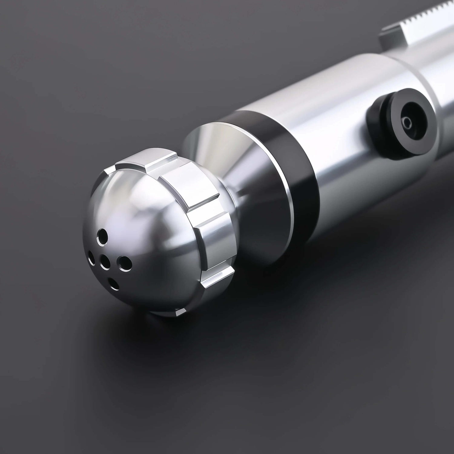 Close-up of the Ahsoka Tano CW lightsaber replica hilt showcasing its sleek silver design.