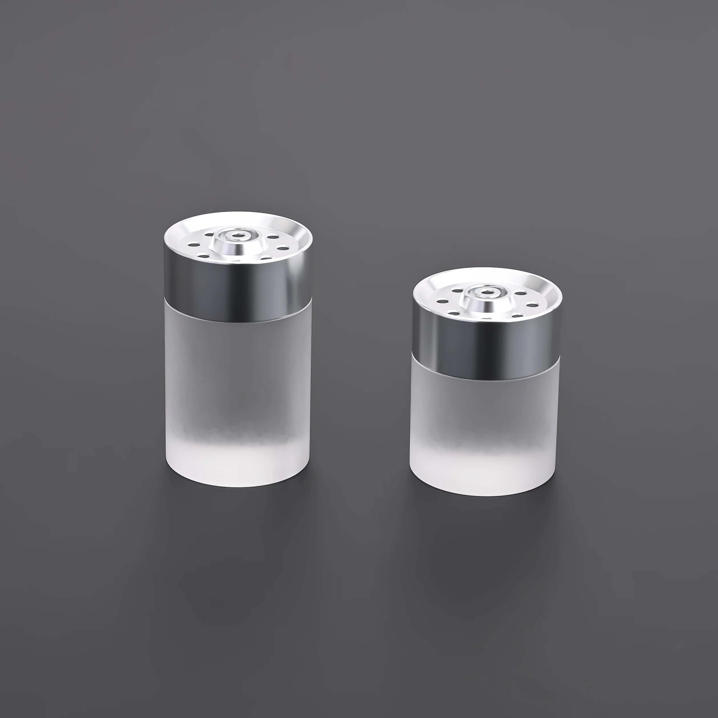 Ahsoka Tano CW lightsaber replica displayed alongside salt and pepper shakers with a sleek design.