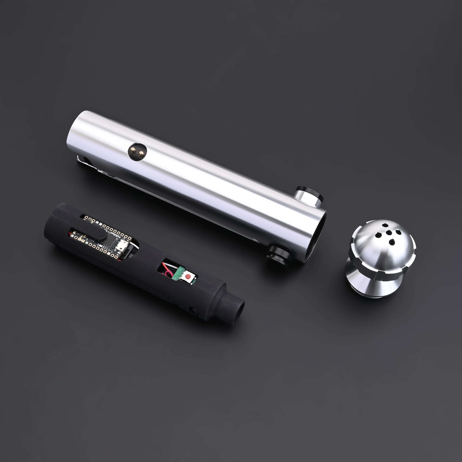 Ahsoka Tano CW lightsaber replica showing the sleek silver hilt and components for fans of the Clone Wars.