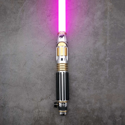 Windu Proffie lightsaber displayed on grey surface, showcasing its unique design with a vibrant purple blade.