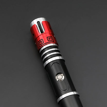 Close-up of the Crimson Vortex lightsaber, showcasing its polished hilt and striking design.