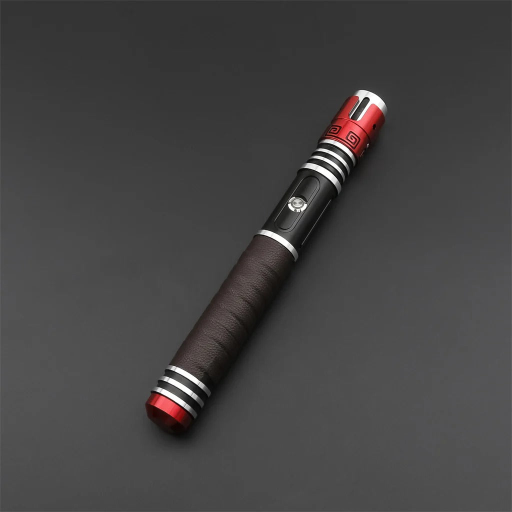 Crimson Vortex lightsaber showcasing its polished hilt and intricate design against a dark background.