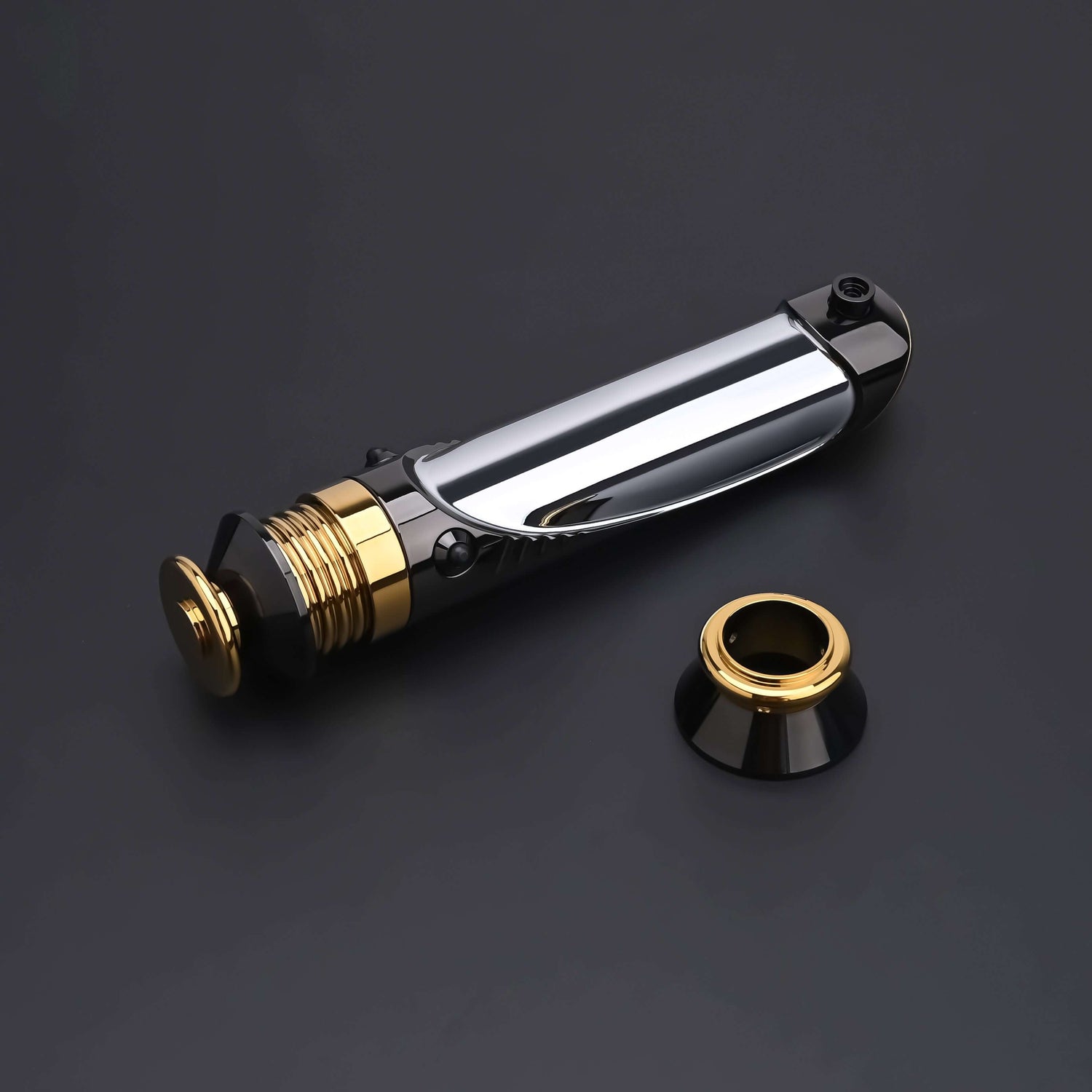 Emperor lightsaber hilt with interchangeable emitter component displayed