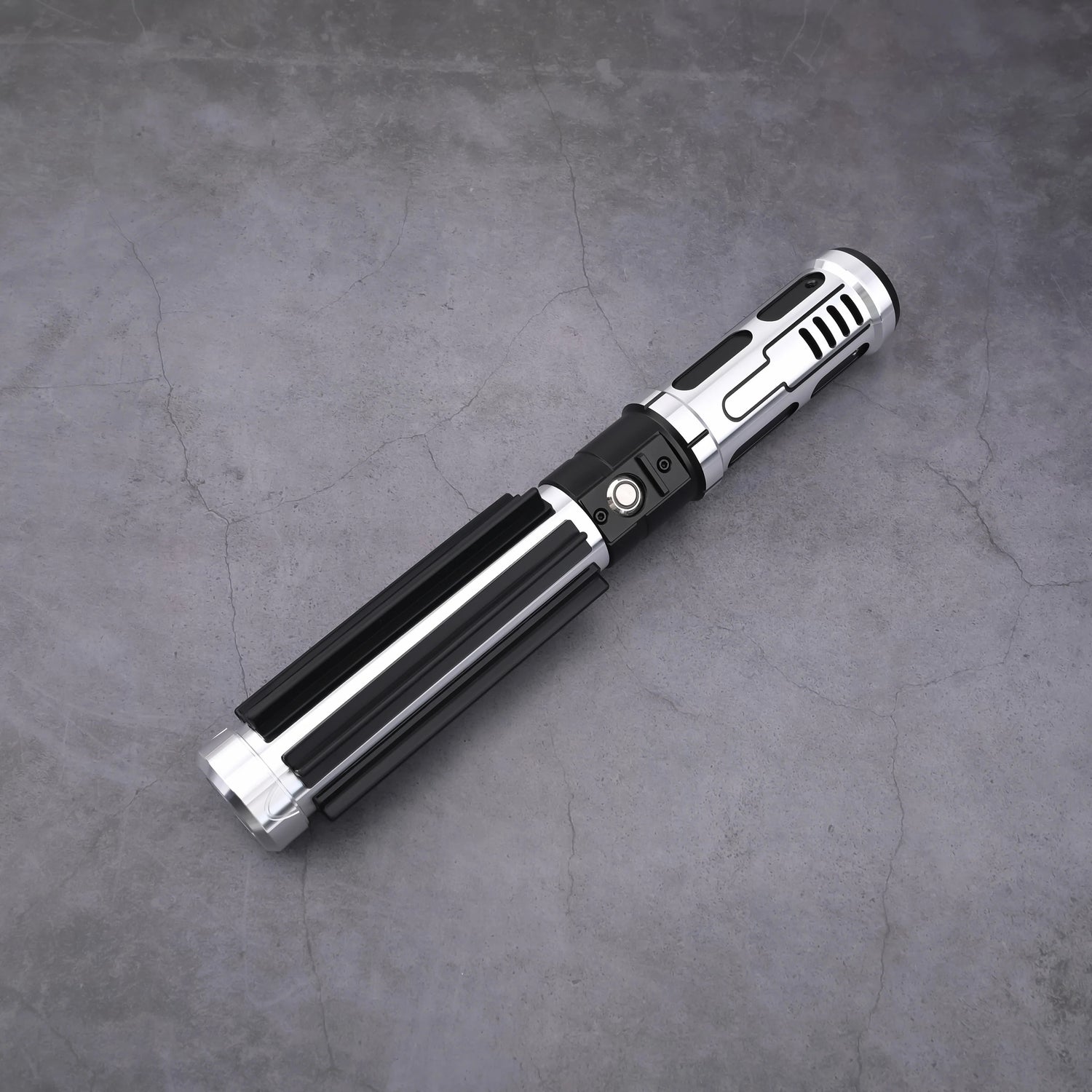 The Void Walker heavy dueling lightsaber with polished silver alloy and matte black finish on a concrete background.