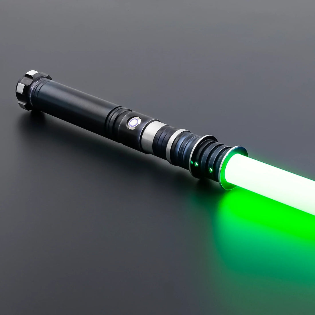Iron Spark lightsaber with green blade ignition