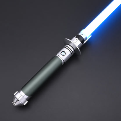 Close-up view of the Kanan SE lightsaber hilt with active green blade illumination