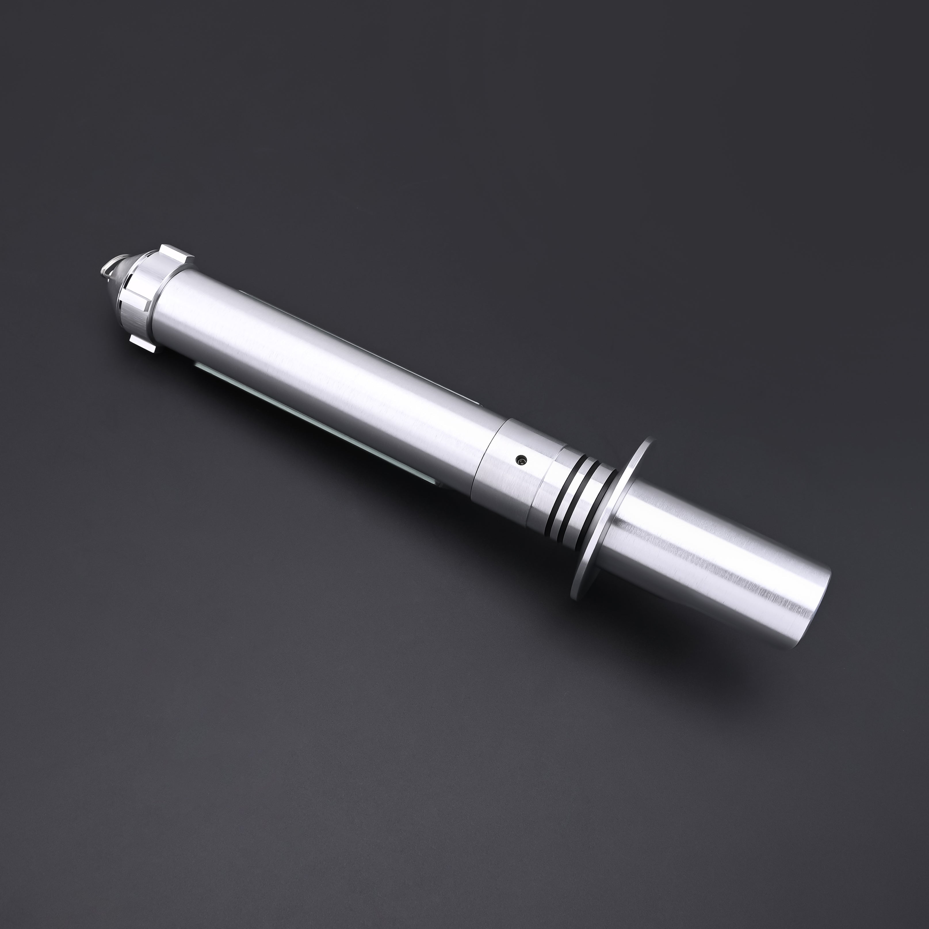 Overhead view of the Kanan SE lightsaber hilt in metallic finish without blade
