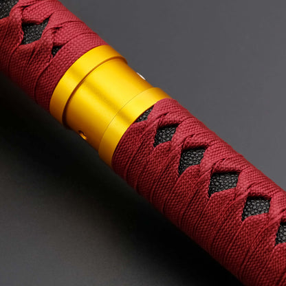 Sekiro Lightsaber: Katana-inspired design with gold hilt, red grip, and gold guard, crafted from aircraft-grade aluminum for durability and elegance.