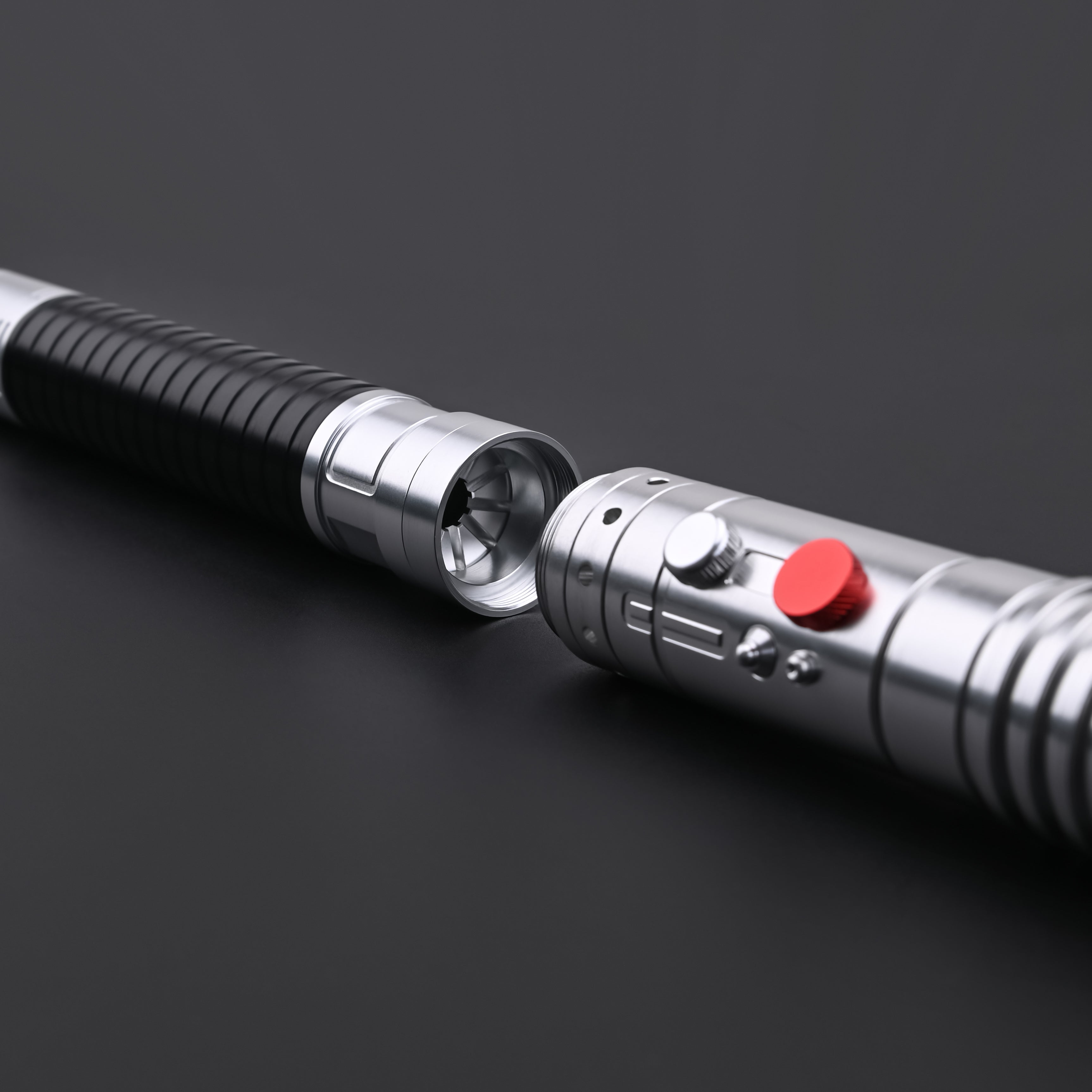 Close-up view of the precision-machined metal hilt on the Maul-Ventress lightsaber