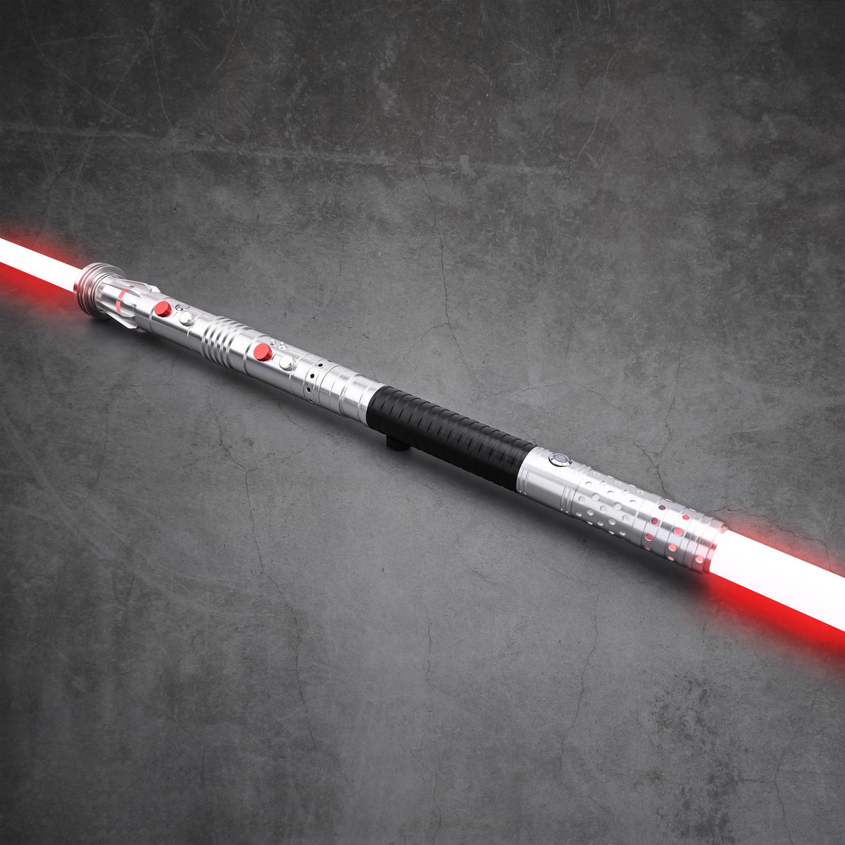 Detailed close-up of the dual-bladed Maul-Ventress lightsaber hilt construction
