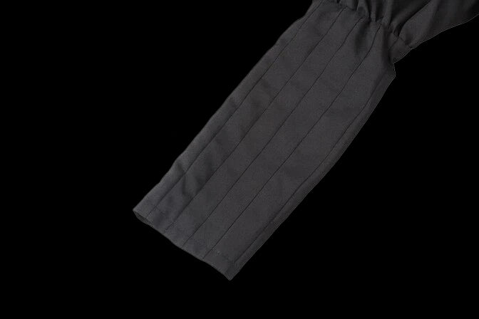 Premium tactical enforcer suit sleeve detail showcasing premium fabric and structural design.