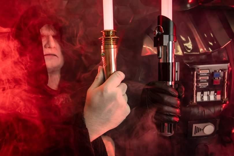 Cosplayers portraying Darth Vader and the Emperor using NovaSaber cosplay lightsabers