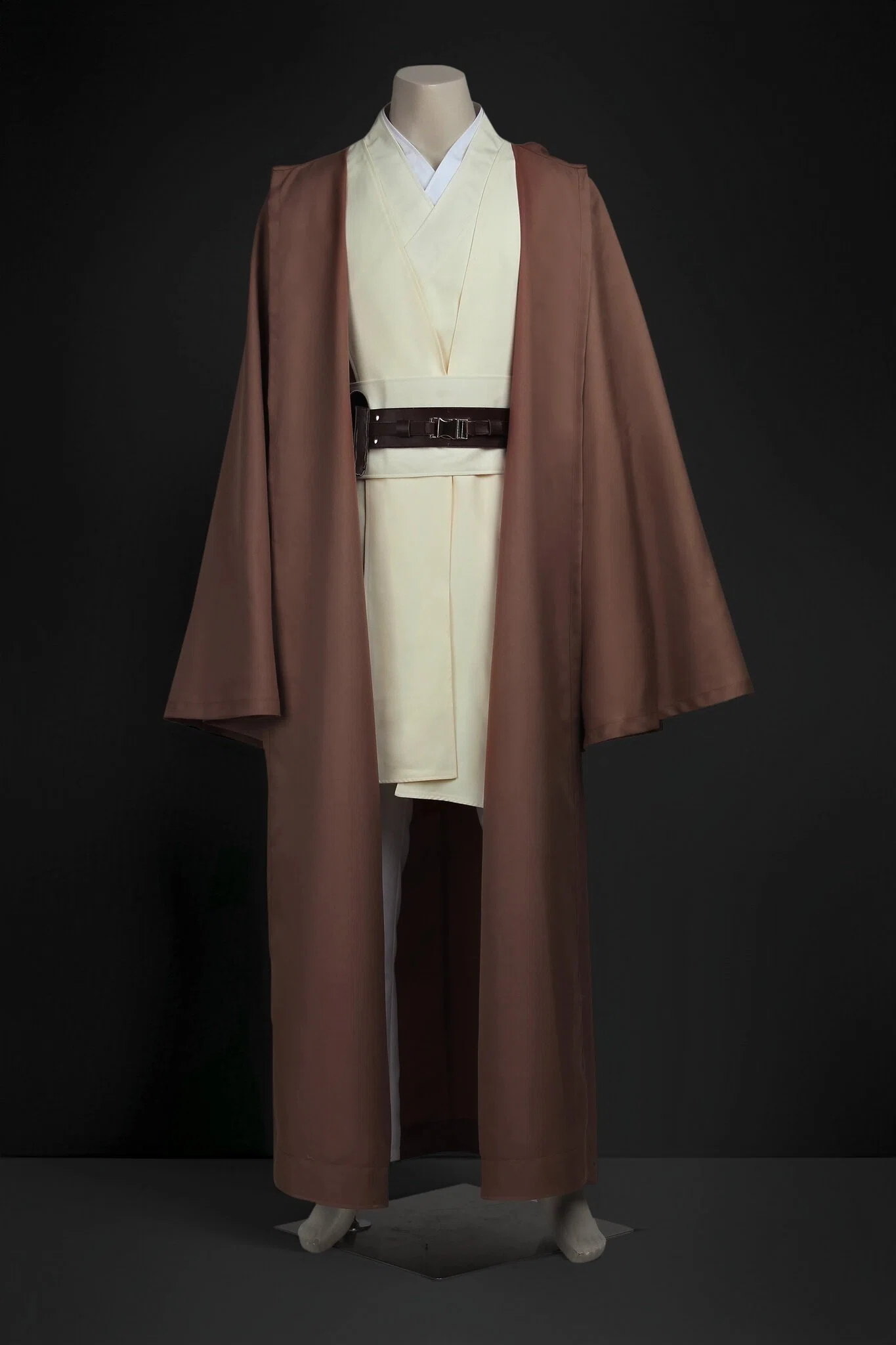 Obi-Wan Kenobi Jedi costume featuring inner vest, outer tunic, hooded robe, pants, and utility belt.