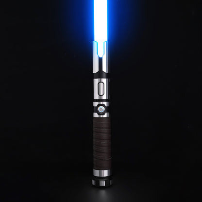 Obsidian Elite Trinity lightsaber hilt standing upright with glowing blue blade