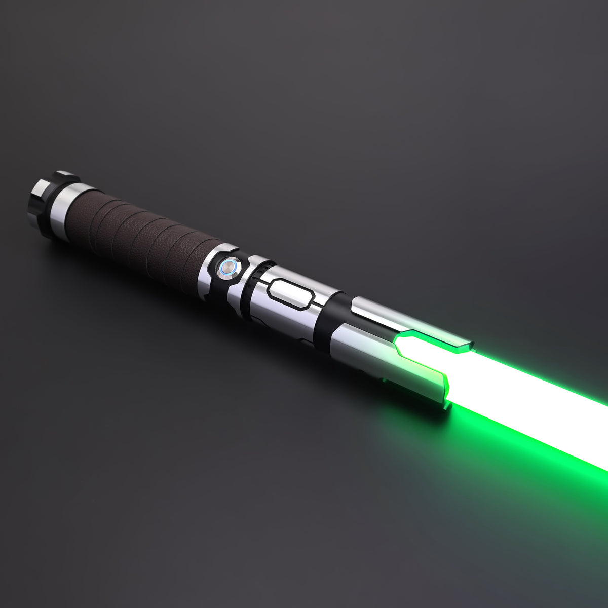 Close-up of an Obsidian Elite Trinity lightsaber hilt with a bright green blade
