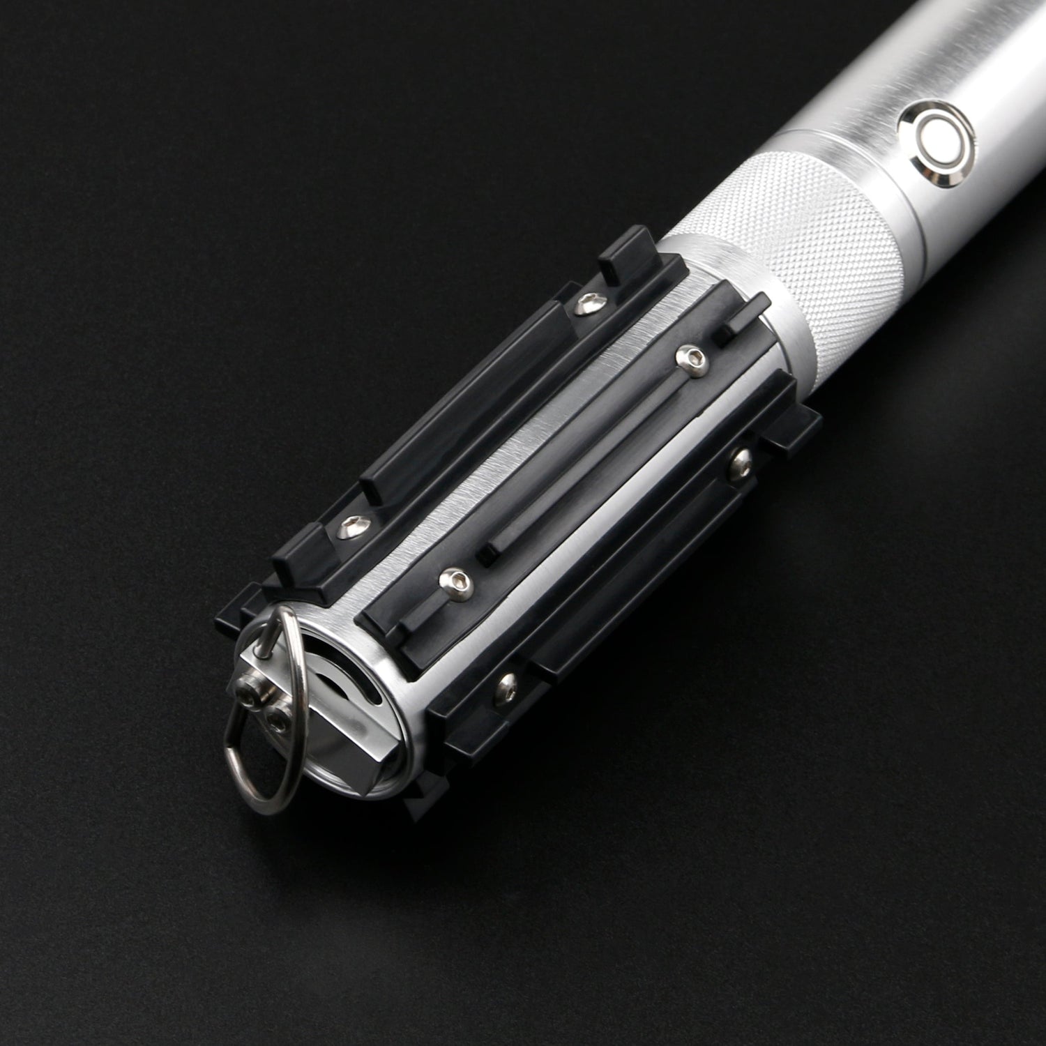 Close-up of the Obsidian Elite Trinity lightsaber hilt design and grip details