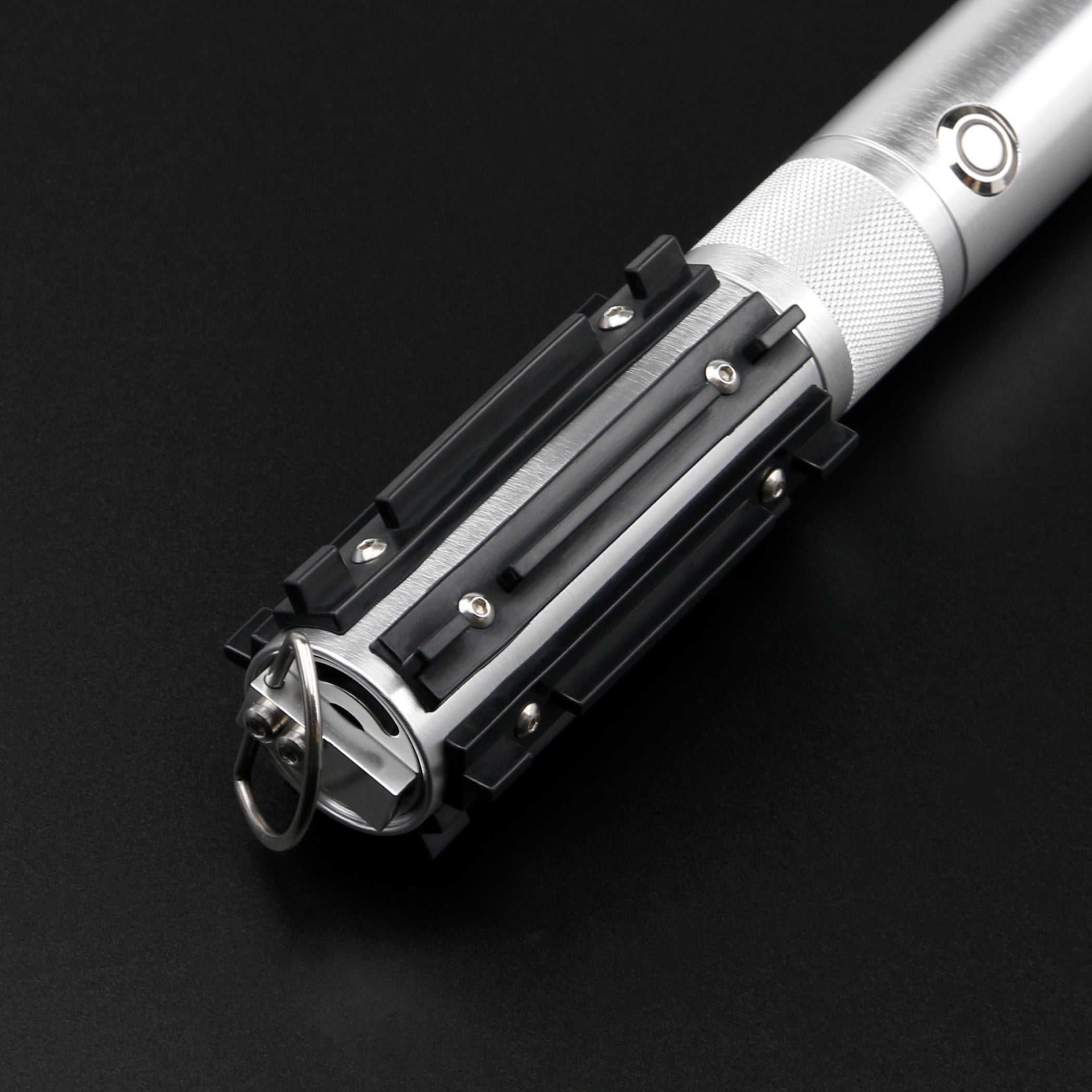 Close-up of the Obsidian Elite Trinity lightsaber hilt design and grip details