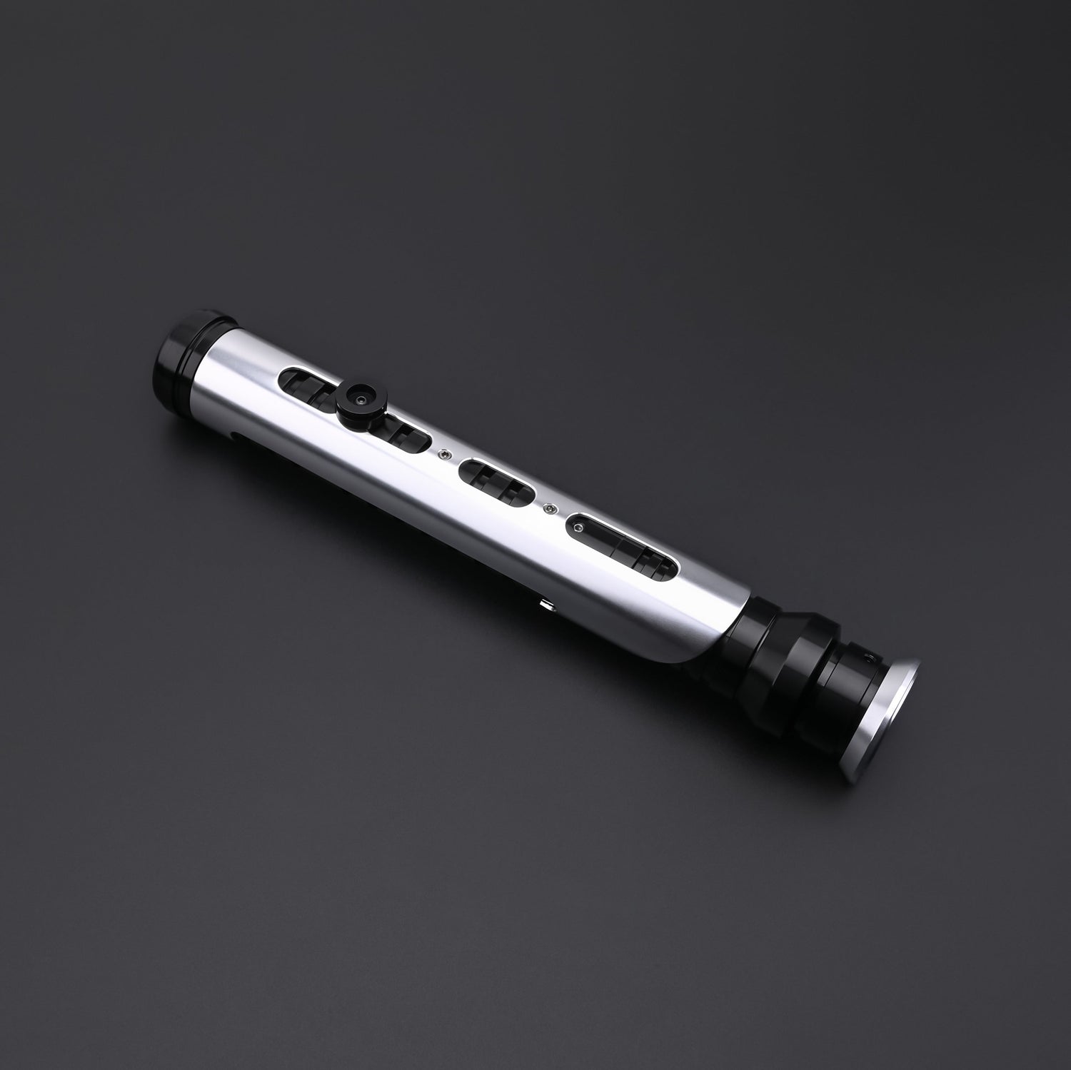Detailed metallic emitter and grip texture of the Qui-Gon SE lightsaber hilt