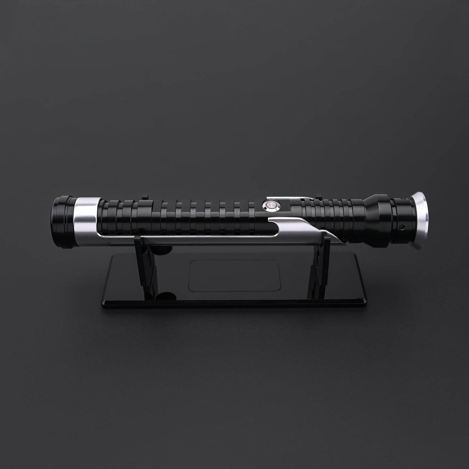 Qui-Gon SE lightsaber hilt displayed on a professional display stand