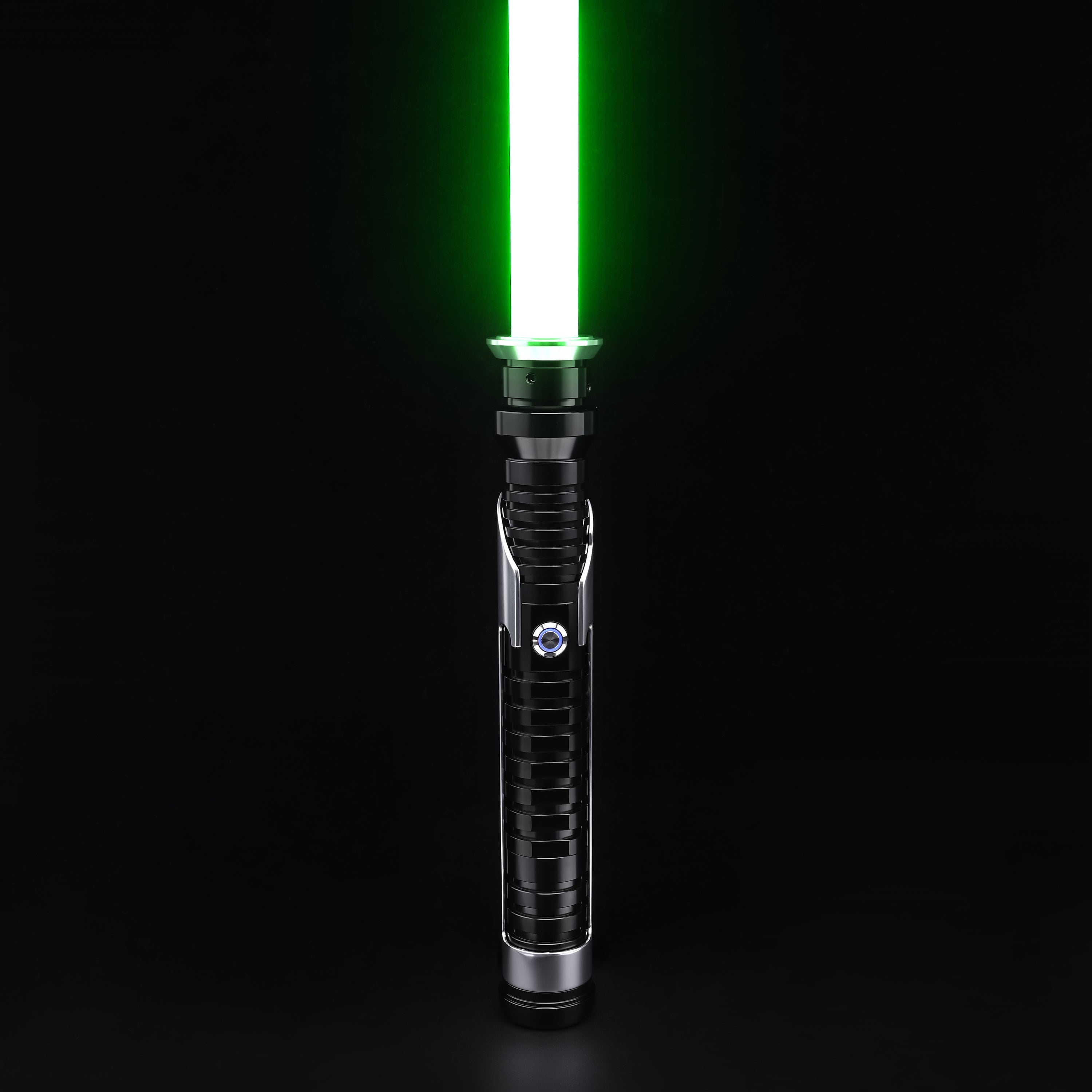 Qui-Gon SE lightsaber hilt standing upright with a vibrant green blade