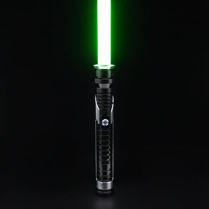 Qui-Gon SE lightsaber hilt standing upright with a vibrant green blade