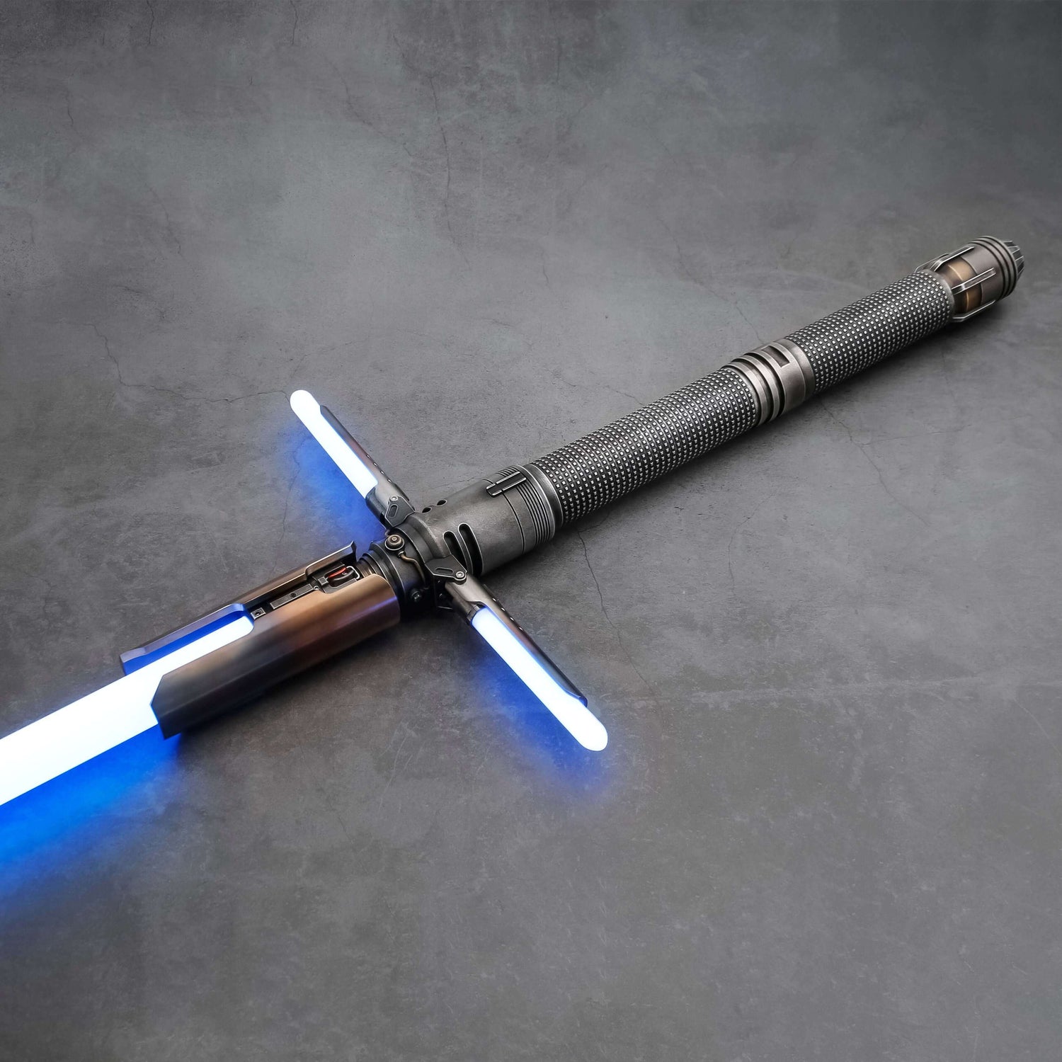 Survivor Crossguard Bundle: tactical lightsaber with blue blades on a textured backdrop.