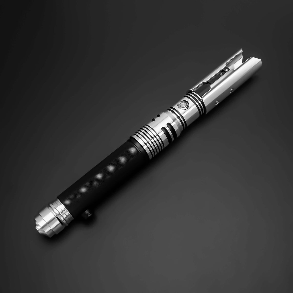 tactical lightsaber and outfit bundle showcasing a sleek black and silver lightsaber on a dark background.