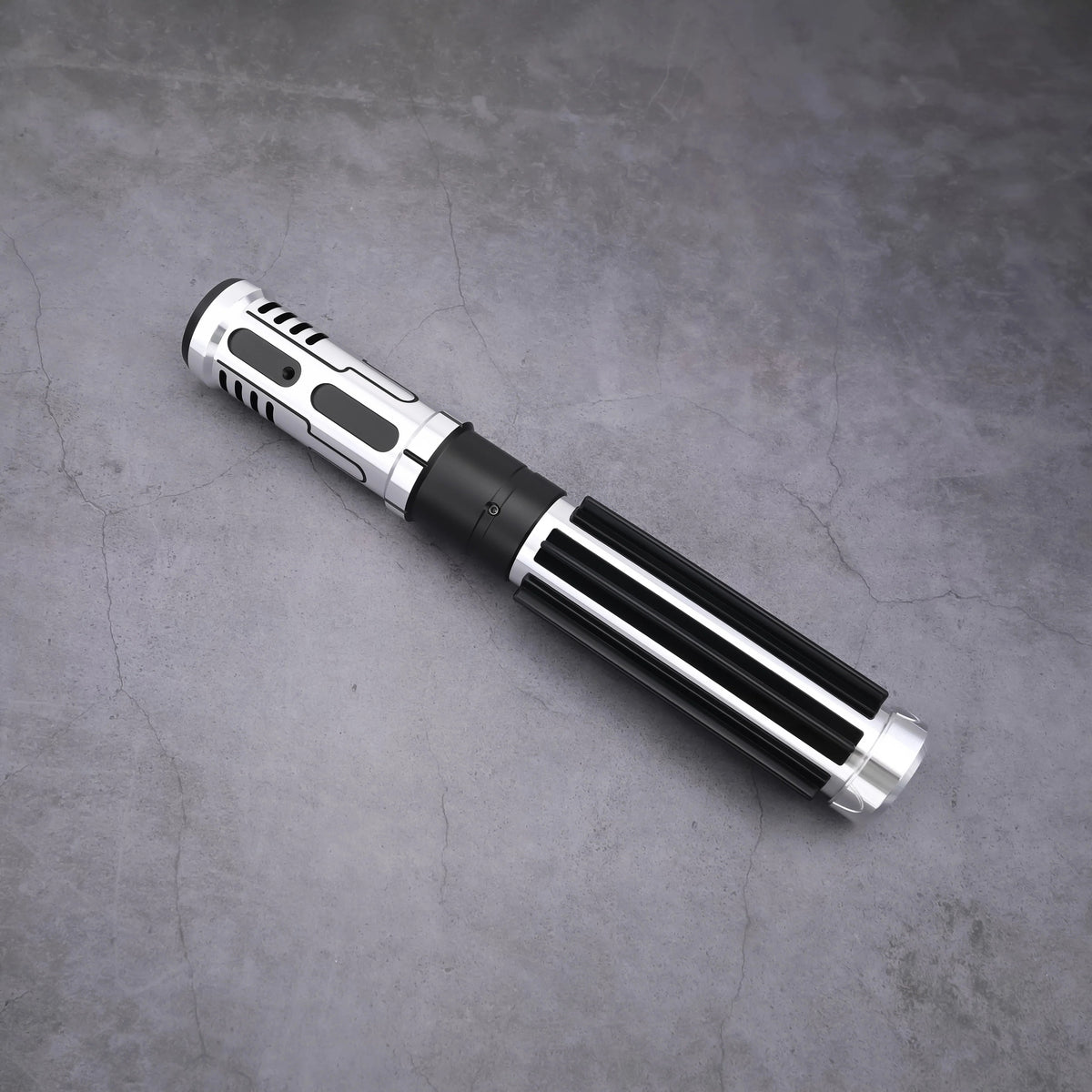 The Void Walker heavy dueling lightsaber featuring a polished silver alloy body and matte black finish.