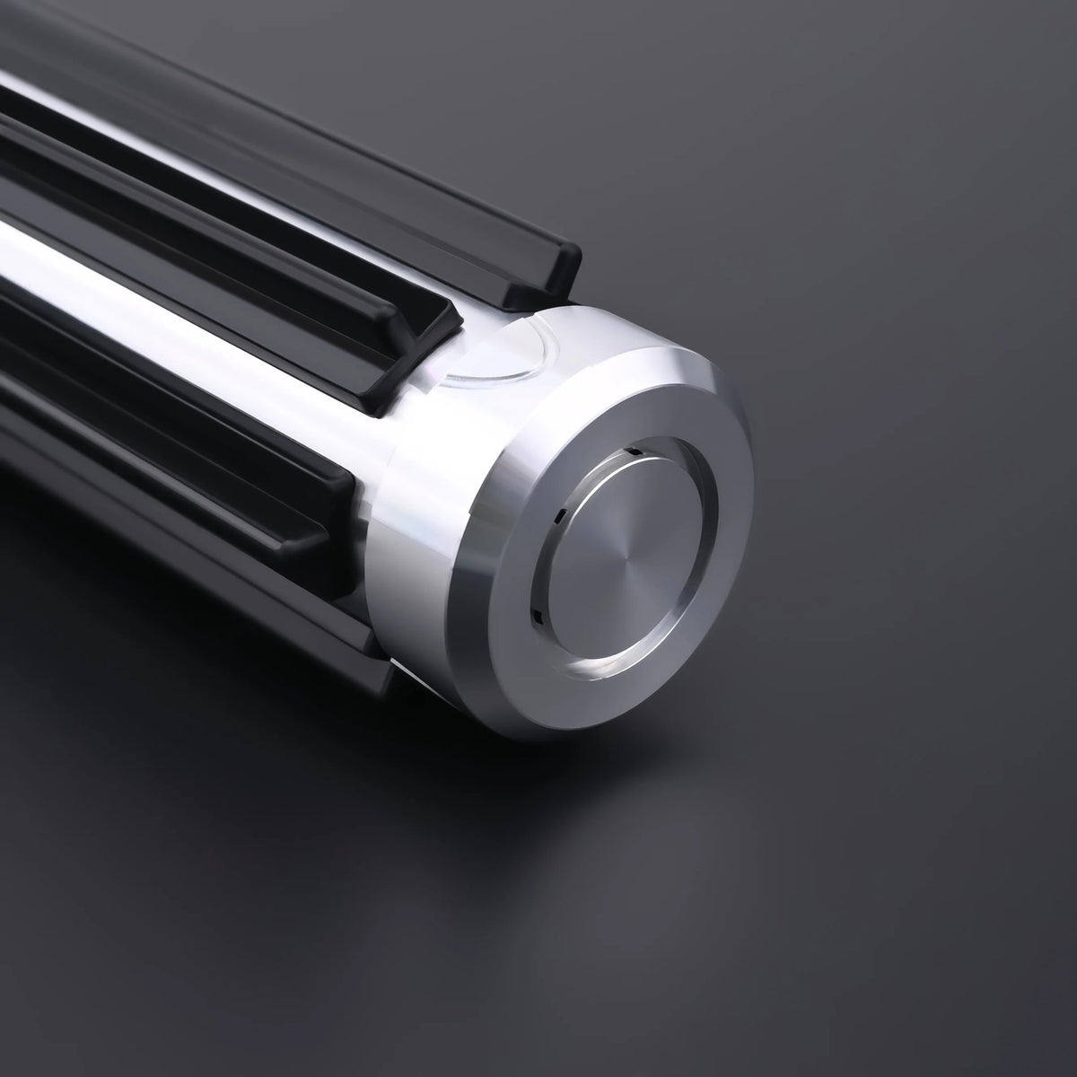 Close-up of The Void Walker heavy dueling lightsaber featuring polished silver and matte black design.