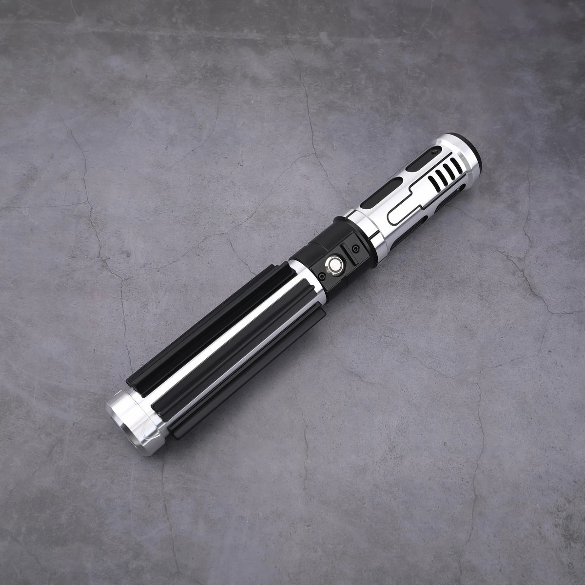 The Void Walker heavy dueling lightsaber with polished silver alloy and matte black finish on a concrete background.