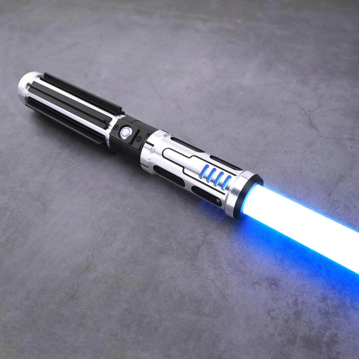 The Void Walker heavy dueling lightsaber with blue blade and polished silver alloy design on a textured surface.