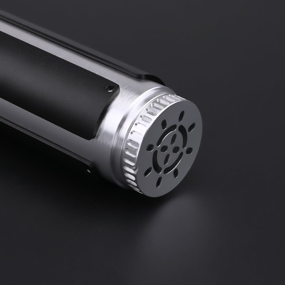 Close-up view of the hilt of the Yoda SE Lightsaber, showcasing its detailed design and craftsmanship.